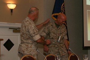 Lt. Gen. Dennis J. Hejlik, USMC (l), commanding general, II Marine Expeditionary Force, demonstrates basic information technology with Brig. Gen. David H. Berger, USMC, director of plans and strategy, at the chapter's USMC IT Day in April.